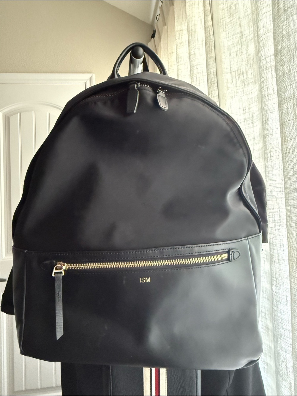 Black Women's Backpack with Gold Zipper Accent